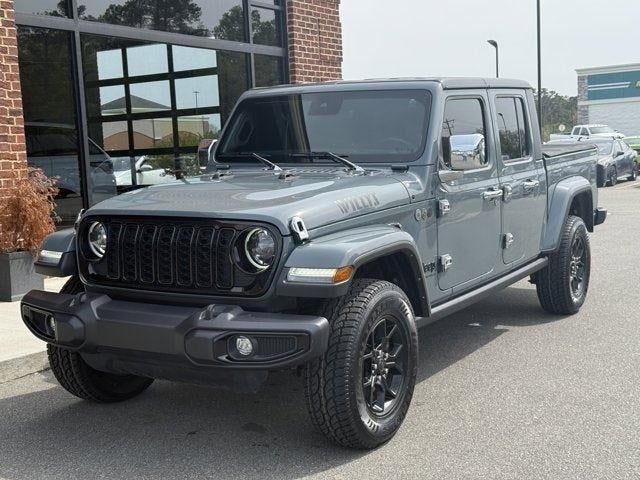 2024 Jeep Gladiator Willys in Anvil Clear Coat — front three-quarter view