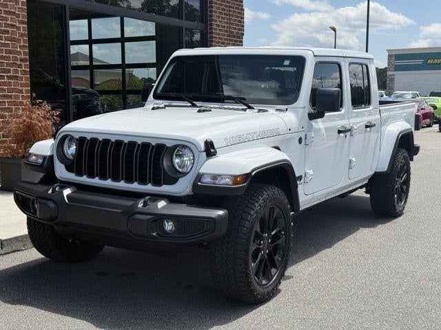 2025 Jeep Gladiator Nighthawk in Bright White Clearcoat — front three-quarter view