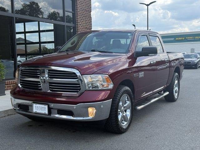 2017 RAM 1500 Big Horn in Delmonico Red Pearlcoat — front three-quarter view