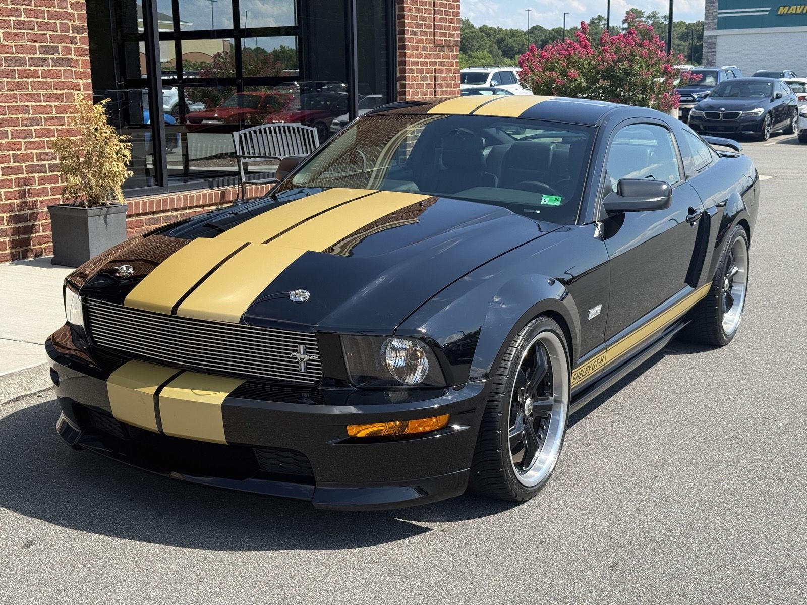 2006 Ford Mustang GT Deluxe in Black — front three-quarter view