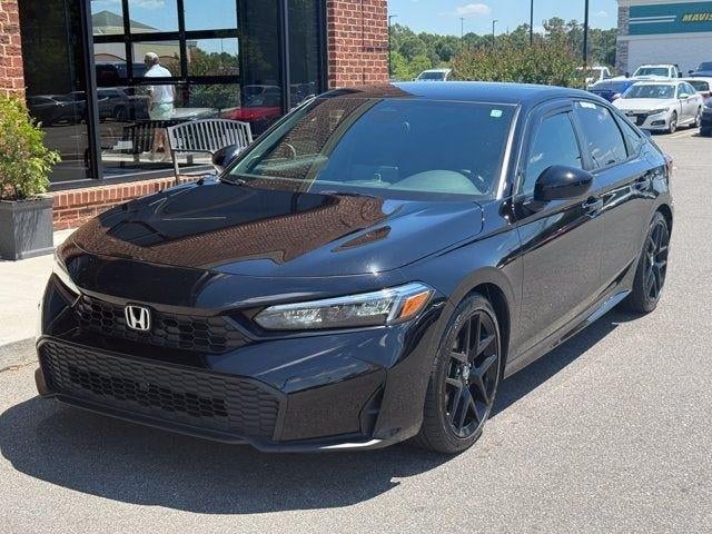 2026 Honda Civic Sport in Crystal Black Pearl — front three-quarter view