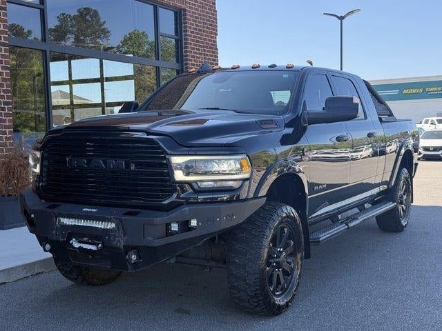 2020 RAM 2500 Laramie in Diamond Black Crystal Pearlcoat — front three-quarter view